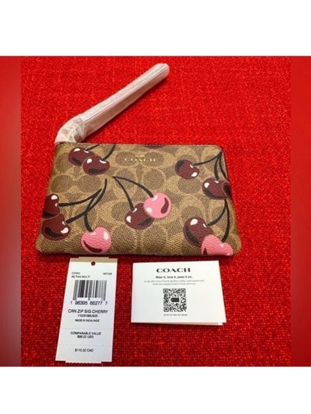 ❤️❤️❤️New coach wristlet/wallet with cherry print❤️❤️❤️